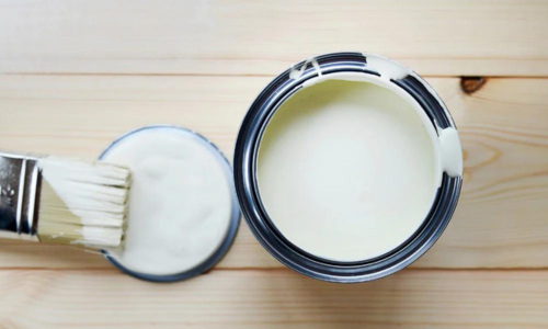An open can of white paint
